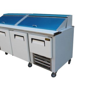 A commercial refrigerator with blue top and wheels.